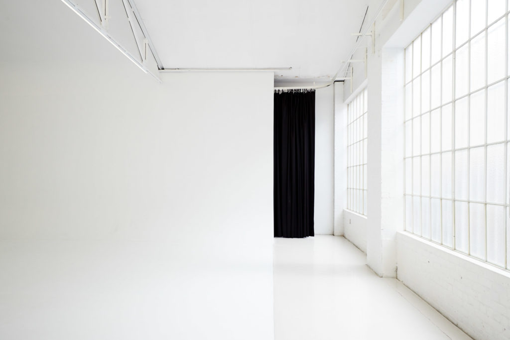 Daylight Studio for Hire in Sydney. Photo of the cyclorama and windows at Studio 6C